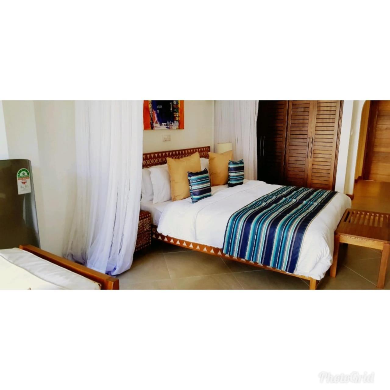 Mbili Kuwili Studio Suites Диани-Бич Экстерьер фото